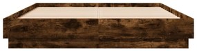 Estrutura de cama com luzes LED 140x200 cm carvalho fumado